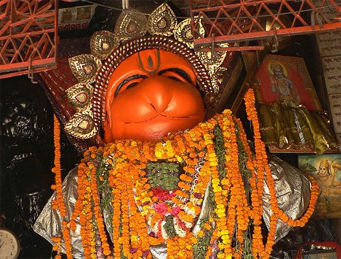 Orange Hanuman - Hanuman Applying Sindoor over his Body